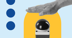 A black and white photographic image of a hand about to hit a large emergency stop button, illustrating the title of the blog 'what to do after a ransomware attack'.